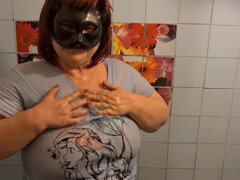Masked BBW granny lady with wet t-shirt shows more
