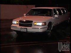 lesbian babes fuck with a strapon inside a limousine
