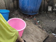 Indian house wife bathing