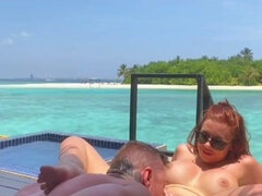 Busty Redhead Amanda Nicole outdoors fuck on vacation on the beach