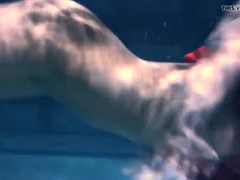 two hot lesbians underwater touching eachother