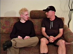 Blond twink and guy in a cap have a threesome with a sexy blonde slut