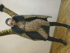 Asian Sissy Ladyboy in Sexy Leopard Coat and Leopard Suit and in High Heels Showing Her Sexy Body
