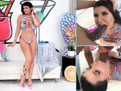 Brunette with big boobs Romi Rain sucks a long black penis on the camera