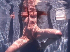 Touching a lovely model’s body under water is pretty exciting.