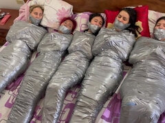5 Mummified Girls Struggle All Wrapped up and Gagged!