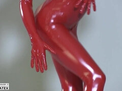 Flexible Slut In A Red Latex Catsuit - Flexible