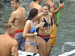 affectionate babes in bikini displaying her big tits at the party outdoor