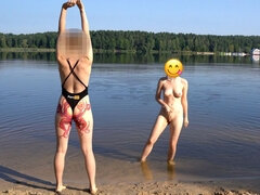 Nudist Girl Goes Skinny Dipping in a Beach