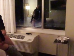 Slutty Latina in See-Through Dress Gives Blowjob in Hotel Hallway