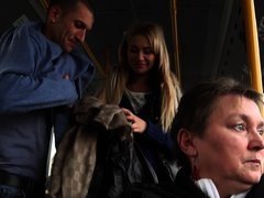 A blonde is getting fucked hard in the bus while people are looking