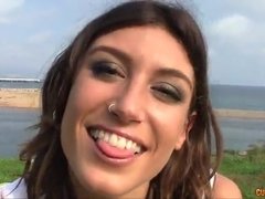 Julia Roca enjoys blowing penis in the park