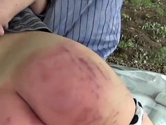 woman outdoor spanking