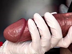 Super close-up handjob in white latex gloves with commentary. Alternative view