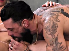 Athletic and tattooed athlete seduces stud to have bareback anal sex