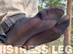 Feet Teasing At The Forest In Torned And Sweaty Black Nylon Socks