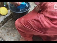 Beautiful Woman Washing Outside