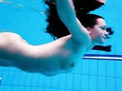 Immaculate shaved teenage in the pool