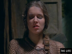 Held by chains a sloppy cougar jacks with a bottle