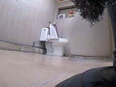 Korean babe using toilet element 5
