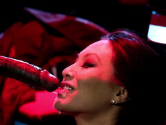 Asian whore Asa Akira blowing big black cock in the shady alley