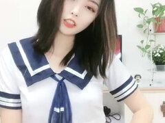 Asian cute webcam girl shows her bald pussy