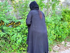 Muslim man with big ass in hijab, stranger on the street in Saudi Arabia - real Arab nationality