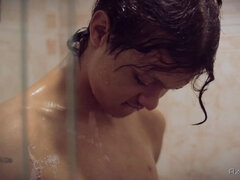 I get horny taking a shower and use an automatic masturbator on my beautiful uncut twink cock until I cum hard