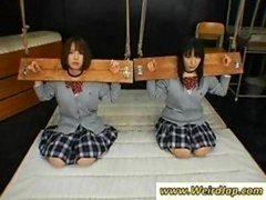 A pair of poor oriental schoolgirls gets punished