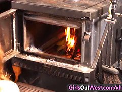 Hairy pussy orgasming by the stove