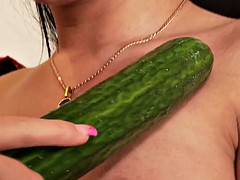 busty lesbian fucking pussy with a cucumber