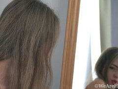 Alex Diaz strips erotically in front of her mirror