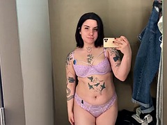 Sheer and mesh clothing tries on sexy tattooed alternative model