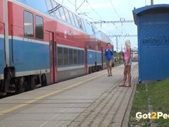 Blonde hottie caught peeing on the train platform & begs for a quickie