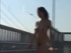 Subtitled busty Japanese public nudist goes for a walk