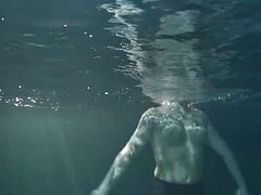 Clothed underwater beauty Bulava Lozhkova swimming naked