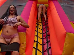 Horny lesbians fuck in a bouncy castle