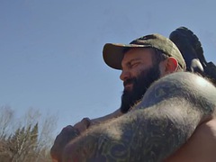 Bearded gay hunter fucks jock in the forest outdoors on quad