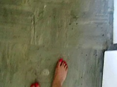 Sissy scrubs a dirty kitchen floor with spit and her feet