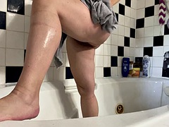 Watch ftm take a fun soapy shower fingering her ass and drying herself off