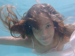 Naked Russian teasing under the water