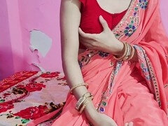 Hot Indian bhabhi in red saree gets seduced in a corner