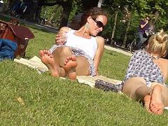 Candid handsome feet in the park