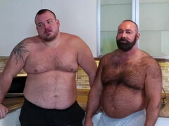 Two fat guys with sexy bellies fucking in the kitchen