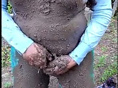 Sexy Crossdresser outside in a muddy mess. I masturbate my big cock and cum in mud, nylon pantyhose and leotard