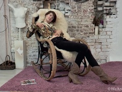 Alise strips naked on her fur chair