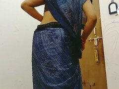 Desi wife in traditional dress undresses and pleasures her pussy