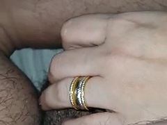 Stepmothers hand slides on her stepsons leg near his cock in bed