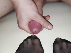 Black nylon sock on Wife's french toenails in element covered by big cum load