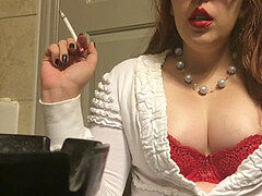 Chubby Teen Smoking Goddess showing off Big perky mammories Red Bra and Sweater